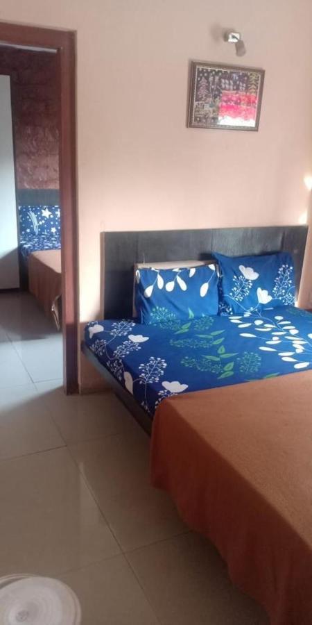 On Point Plaza Bed and Breakfast Murūd Buitenkant foto
